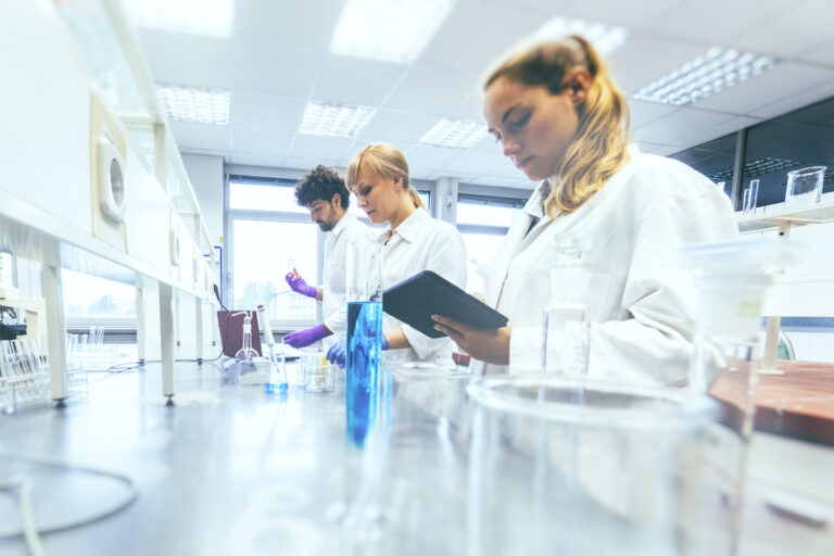 scientists at bench